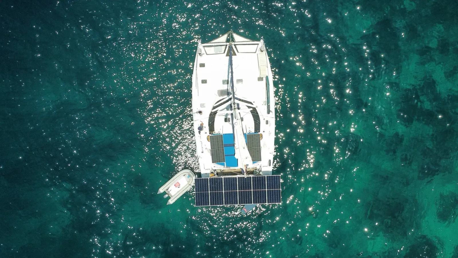 Top-down aerial of Soniya's deck, solar panels and dinghy