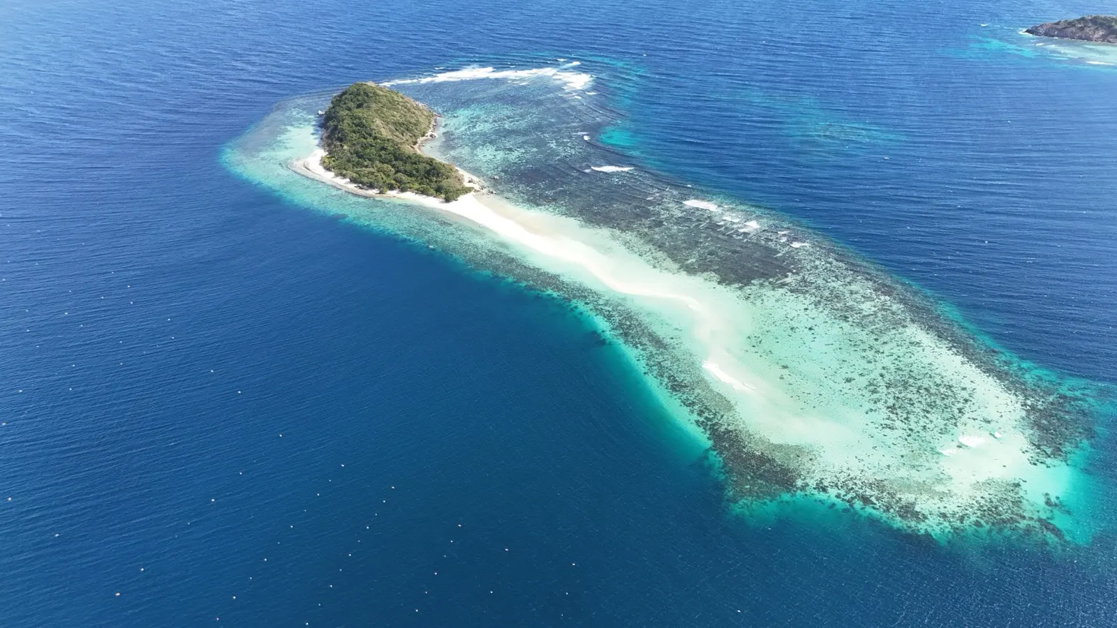 Aerial narrow sandbar/reef strip, different angle