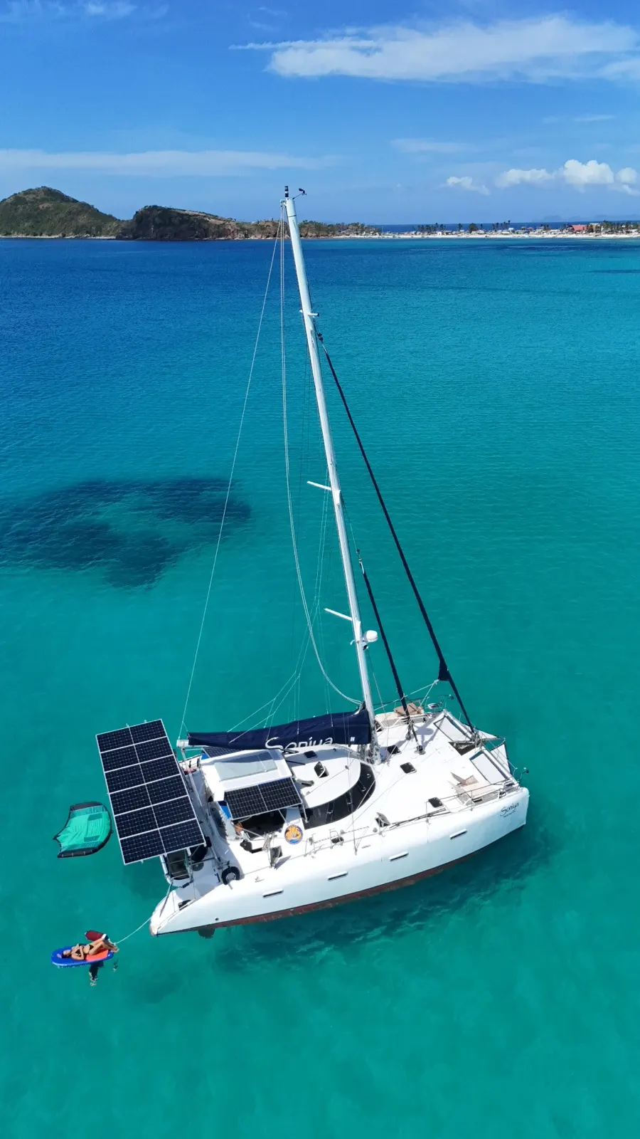 Soniya anchored bow-on beside a small sandy islet