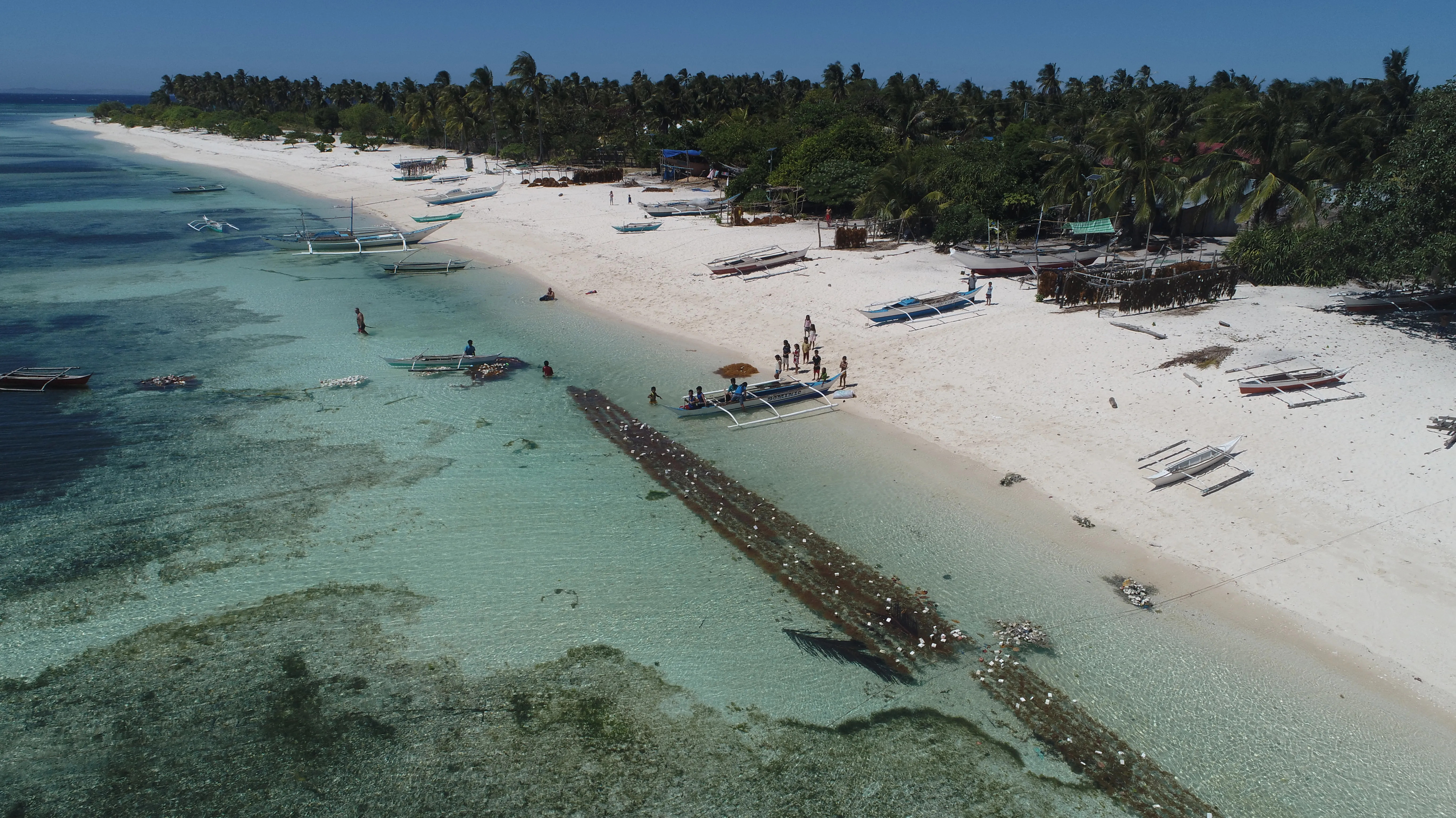 Aerial view of a fishing village along the Mindoro coastline