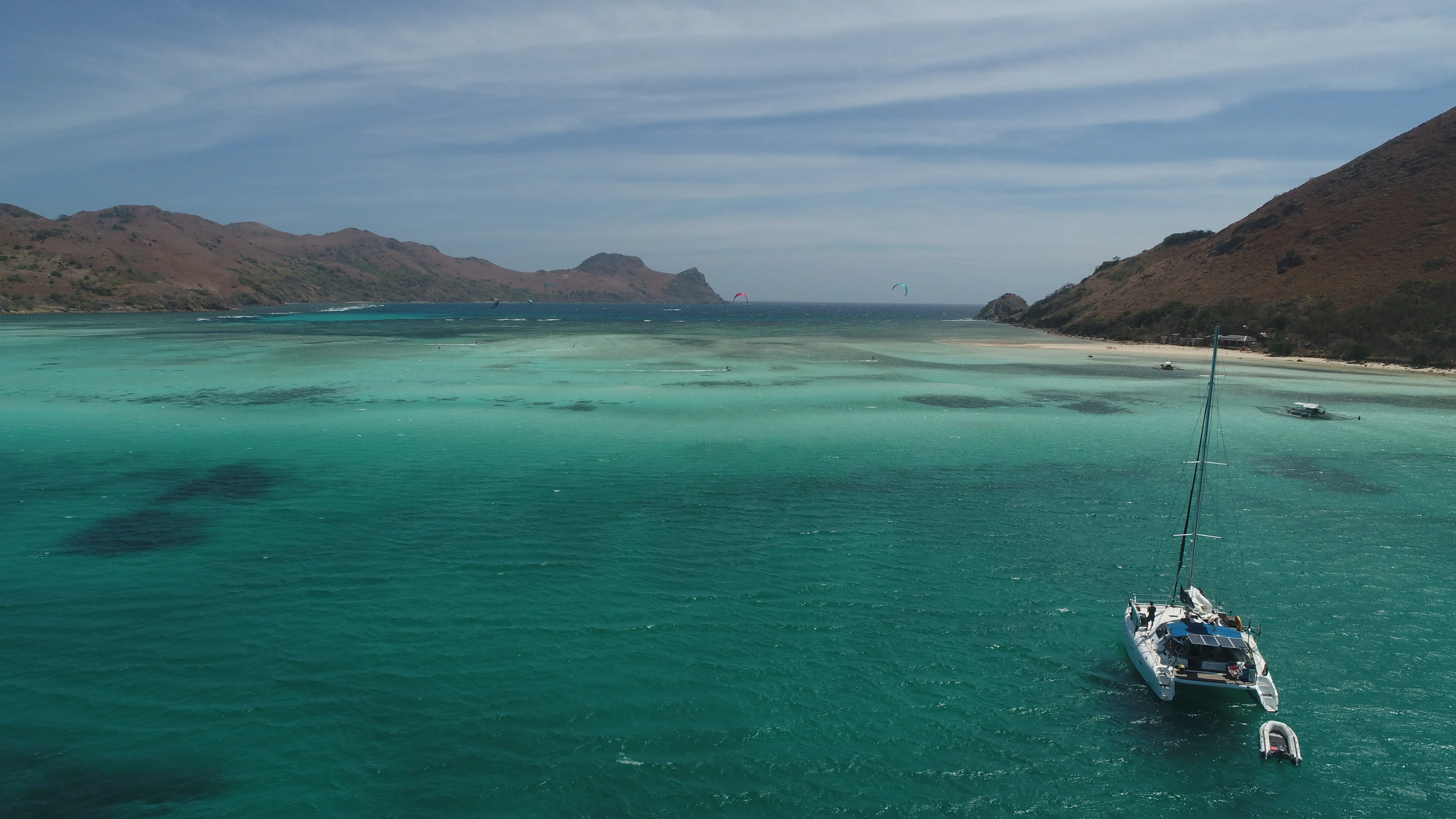Aerial view of Soniya anchored beside an island along the Palawan route