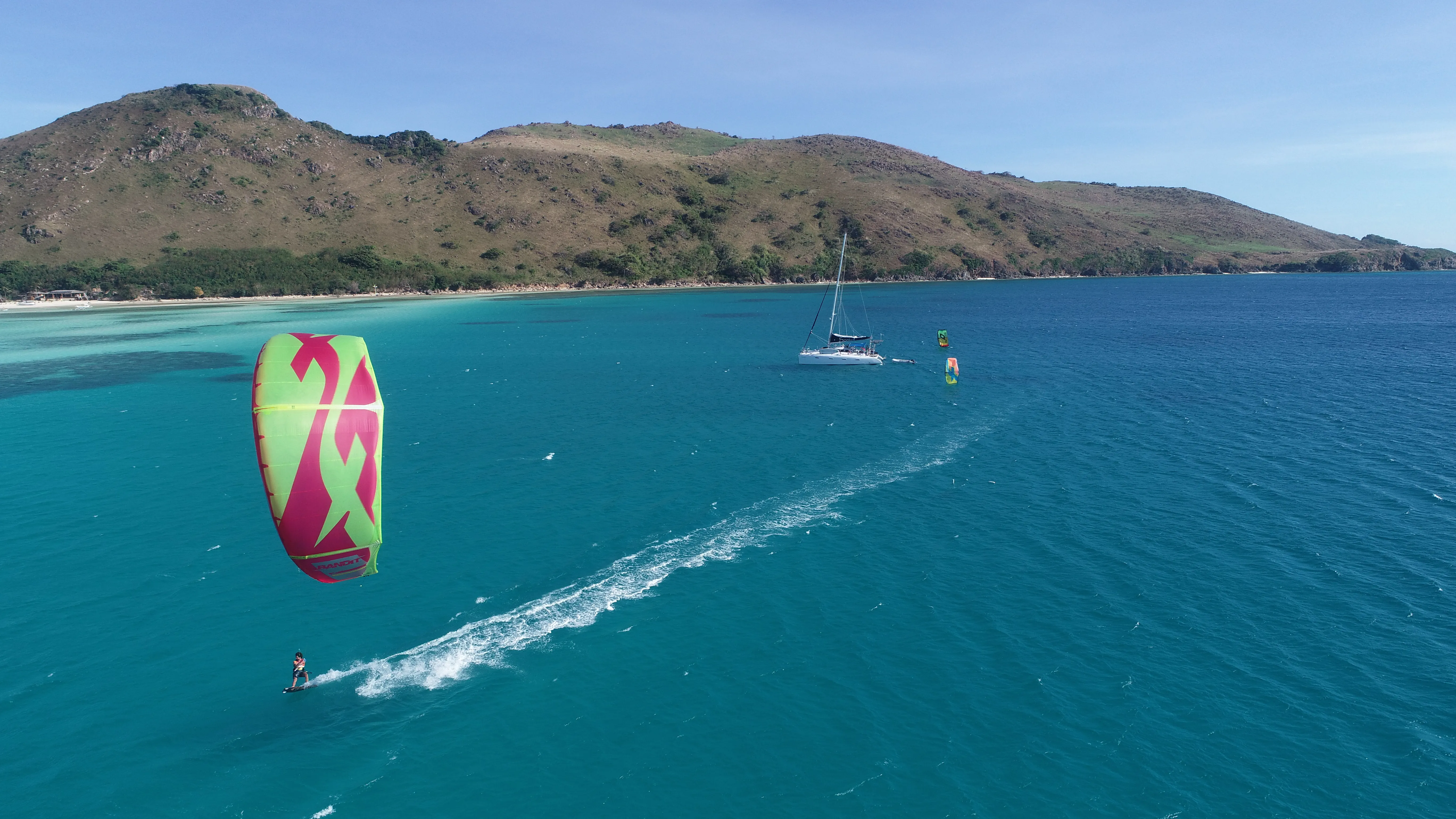 Close-up aerial of a kite and Soniya anchored off Palawan