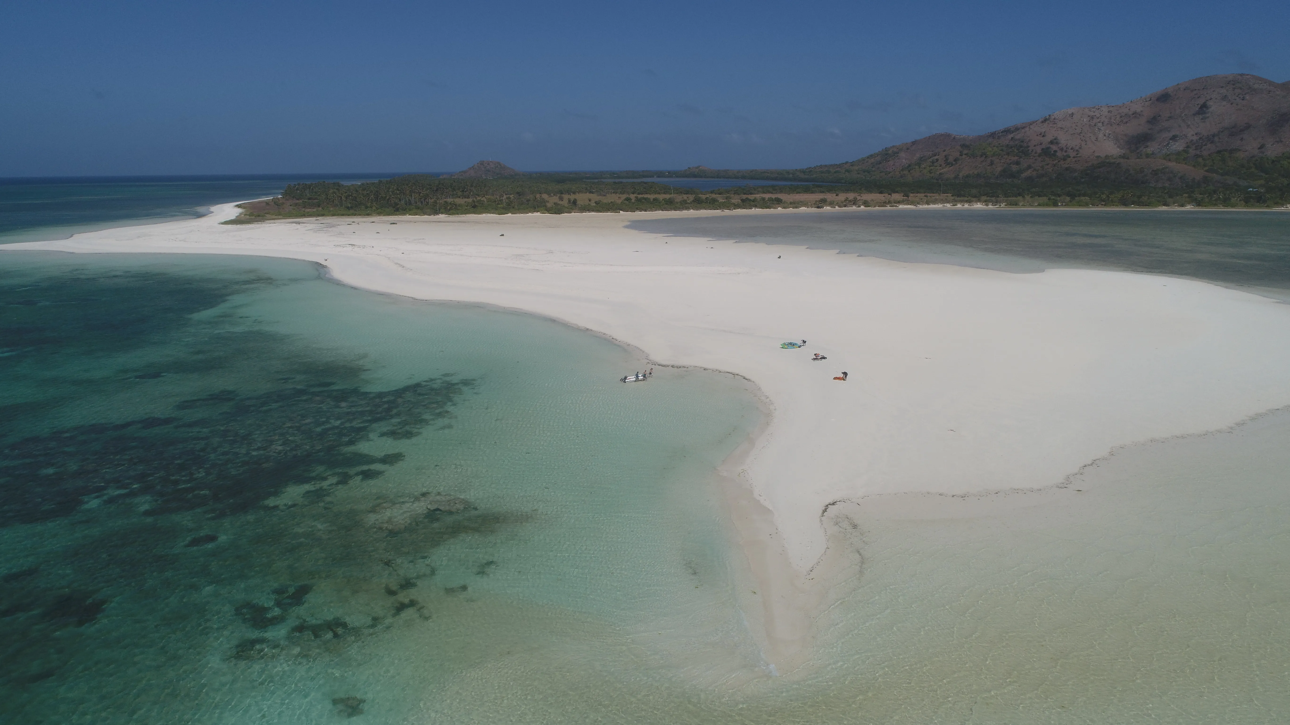Aerial view of a clean white sandbar along the Palawan route