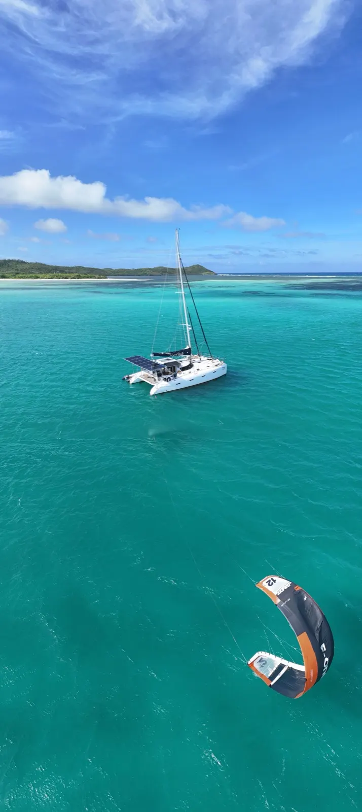 Panoramic aerial of Soniya sailing among scattered islands