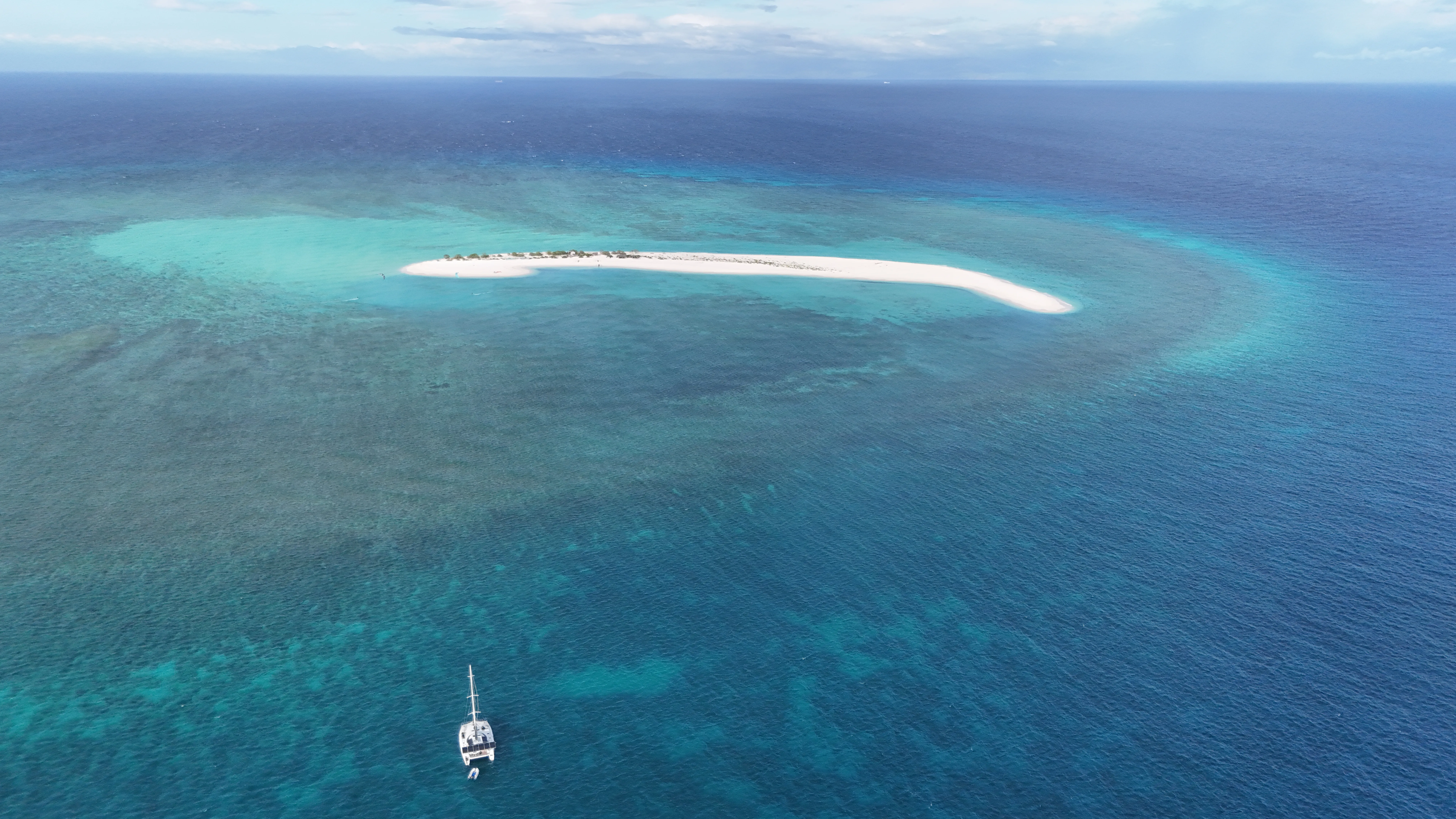 Aerial drone view of the reef and sandbar near Seco Island