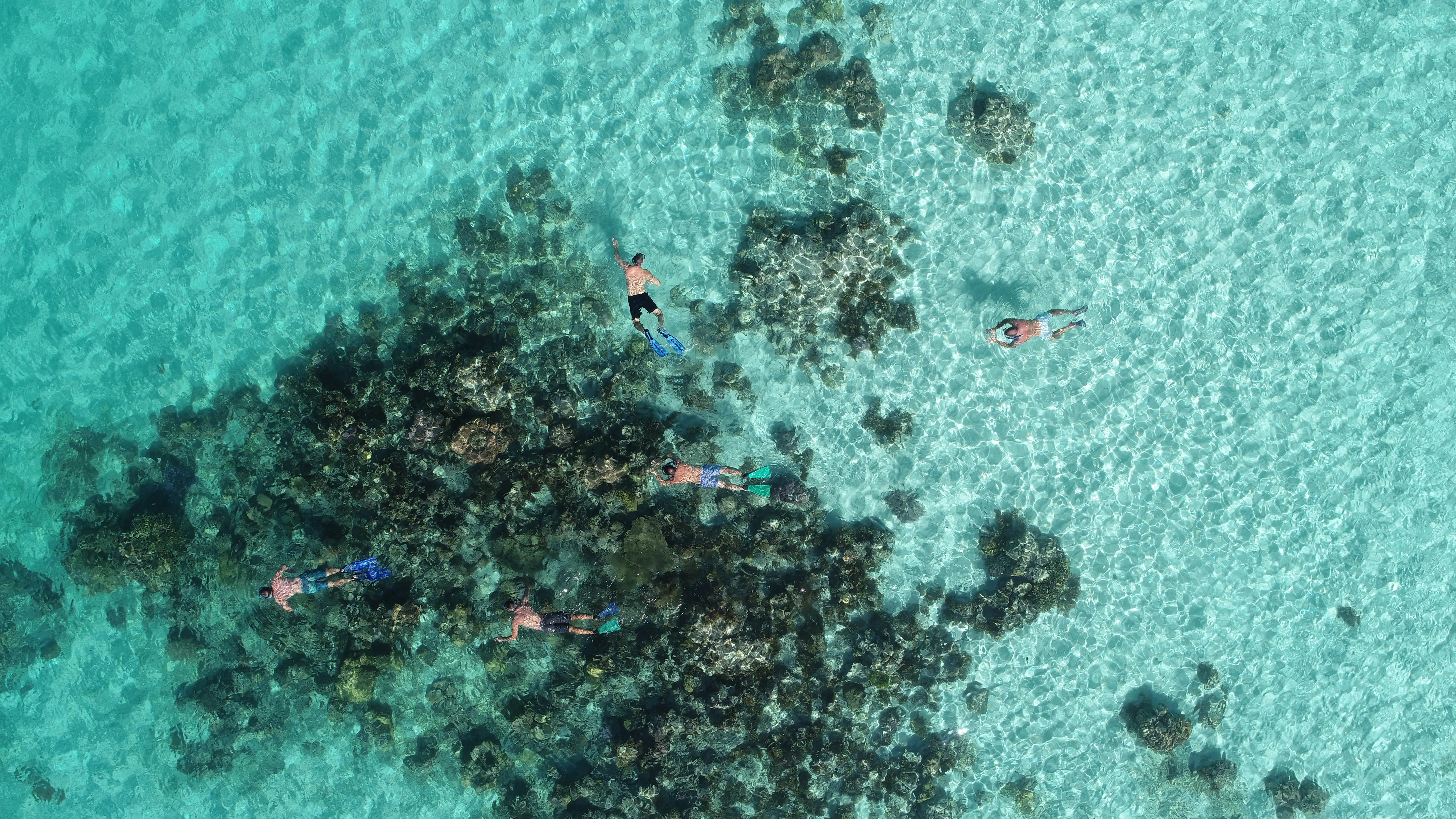 Soniya anchored near a small island with white sand