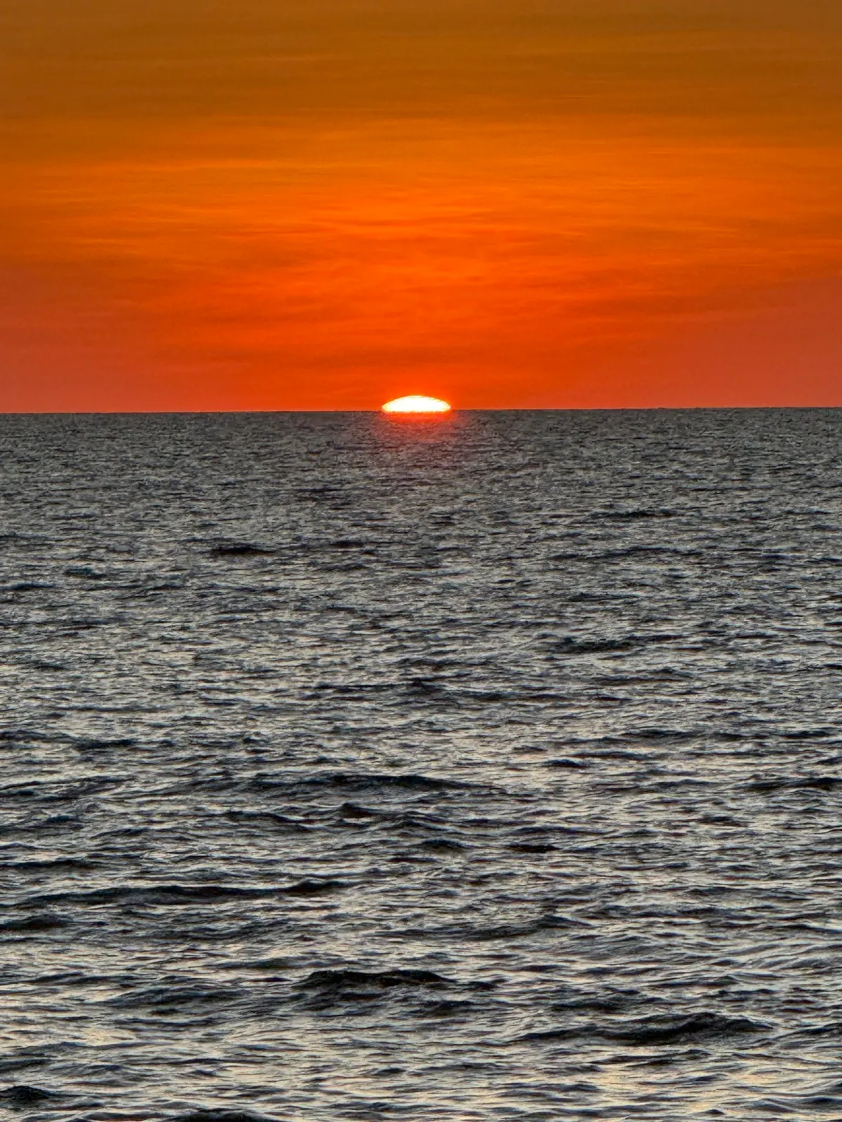 Abstract close-up of sun touching horizon